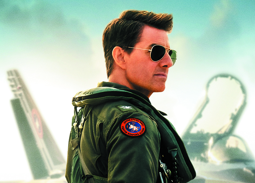 Promotional shot from 'Top Gun: Maverick' with Tom Cruise wearing Ray-Ban aviator sunglasses.