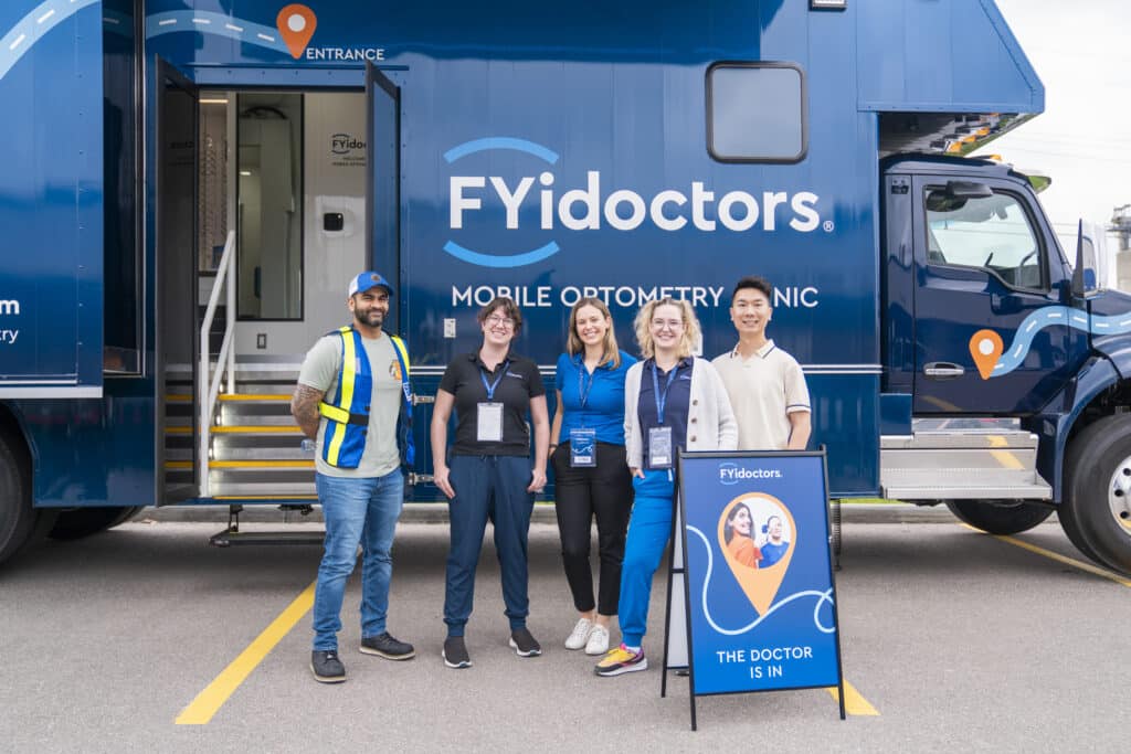 FYidoctors mobile clinic - truck with sign The Doctors is in and employees