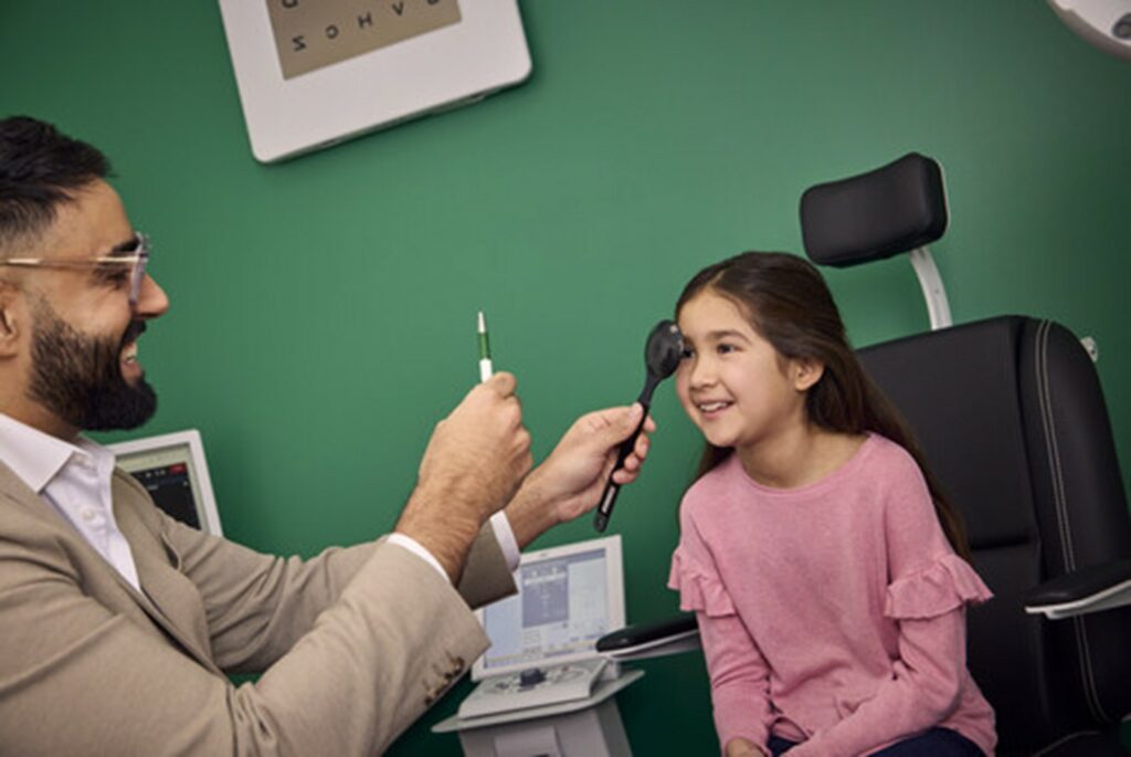 Specsavers OD examening a young girl