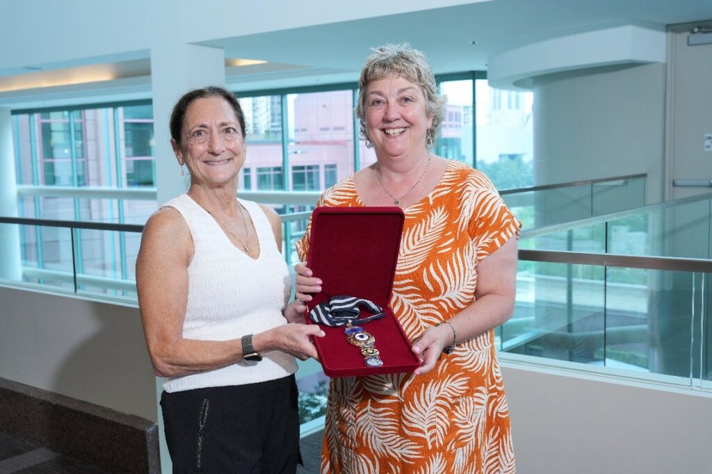 Outgoing World Council of Optometry President Dr. Sandra Block (WCO Immediate Past President 2025-2027) and incoming President Dr. Cindy Tromans (WCO President 2025-2027)